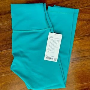 NWT LULULEMON Wunder Train HR Crop Leggings
23" in Teal Size 6